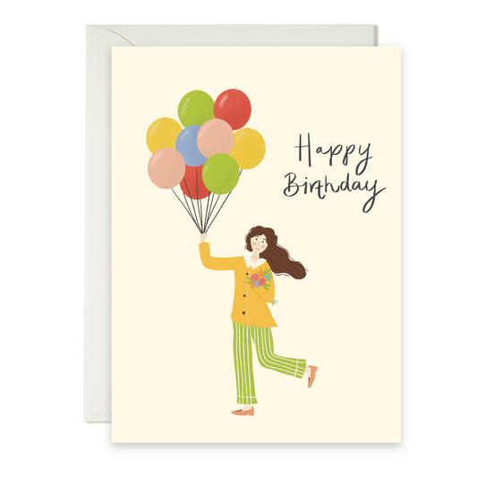 Cheerful greeting card with illustration of a girl holding balloons and 'Happy Birthday' text.