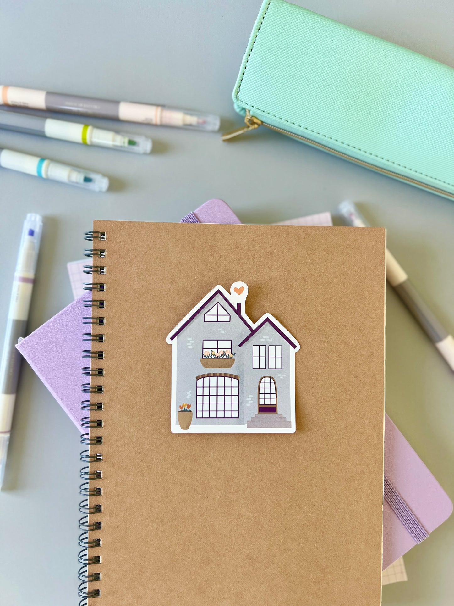 House sticker on a notebook