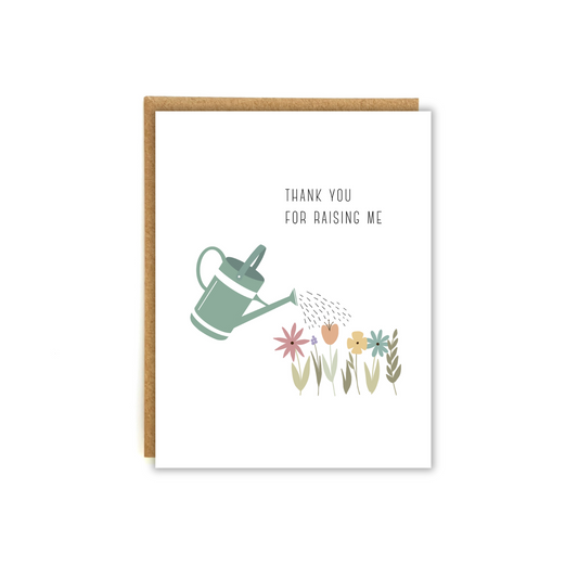 Watering can watering a bed of flowers with the text "Thank you for raising me"