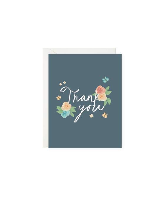 the phrase "thank you" with bold and beautiful garden florals