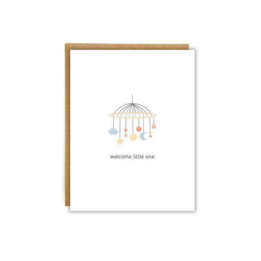 Illustration of a mobile with hanging toys. Below text says "welcome little one"