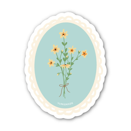 Sticker with floral design on a light blue background