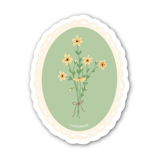 Sticker with floral design on a green background, featuring the brand 'YUMISMADE'.